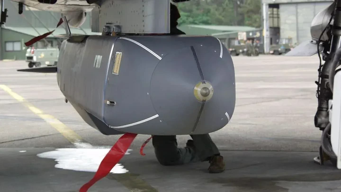 Documentary close-up of a Storm Shadow/SCALP cruise missile, ideally mounted under an aircraft wing. Editorial intent: illustrate the specific weapon system whose classified…